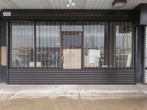 coiling roll down grille gates  Scissor gates deter thieves and provide an added security element to storefronts, dock