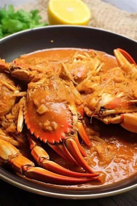 crab shala recipe  Combine chopped tomatoes, red chili powder, garam masala, turmeric powder, coriander powder, and salt to taste in a mixing bowl