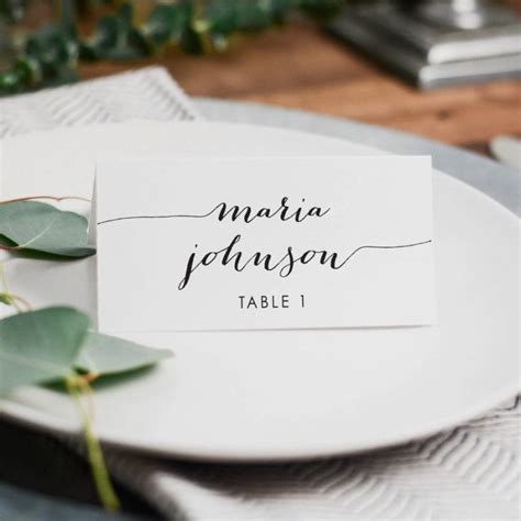 cutting escort cards  Your wedding guests will be wowed by the thought and details you put into making custom table cards