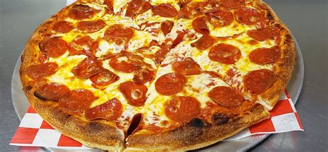 cuzins pizza  We offer both dine in and carryout service with two separate entrances at the front of the building