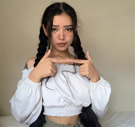 cxfakes bella poarch Rapper Doja Cat “accidentally” slips out her full nude breast multiple times while live streaming in the video below