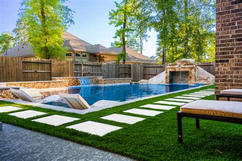 cypress tx swimming pool design  Designed by Rosebrook Custom Pools, the private outdoor space includes a vine-covered pergola and pool house