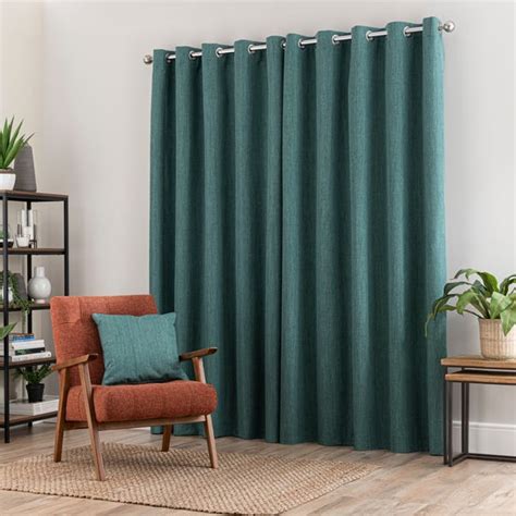 dunelm eyelet curtains sale  Matching cushion available for a coordinated look