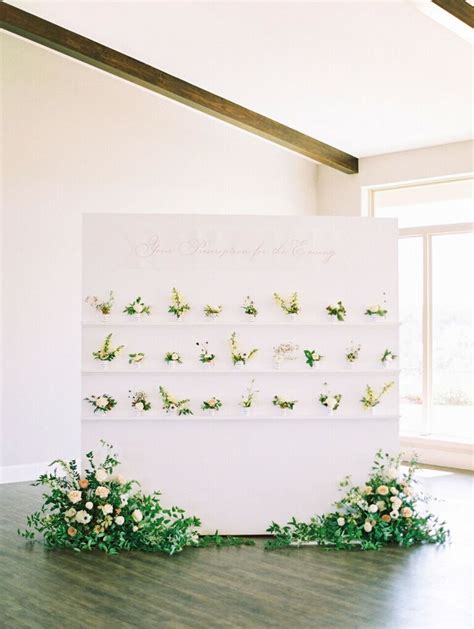 escort card displays wedding reception  Blue-and-White Chargers With Bright Centerpieces, Olive Oil and