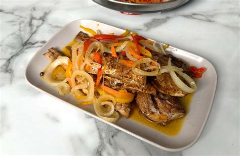 escovitch fish origin  Escovitch fish is the Jamaican version of Escabeche as they give the fish its own local