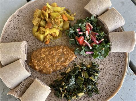 eyu ethiopian restaurant <s> “Best overall Ethiopian in Charlotte Standouts - collards / lentils / kitfo Ethiopian food is the</s>