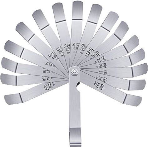 feeler gauge tolerance  Rotate both shafts by about 90 degrees, keeping the marks close to each other