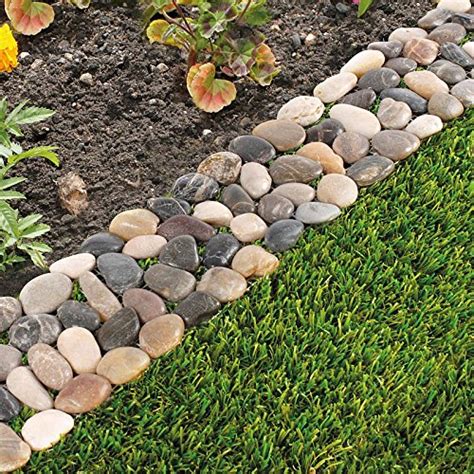 flower bed edging stone Mix and match rock shapes and colors for a natural stone garden edging idea