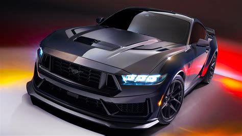 2024 ford mustang dark horse. The 2024 Mustang's interior ditches the dual-hood motif for an extra-large digital display and touchscreen. A Tremec six-speed manual is standard, or drivers can opt for a 10-speed automatic. The ... 