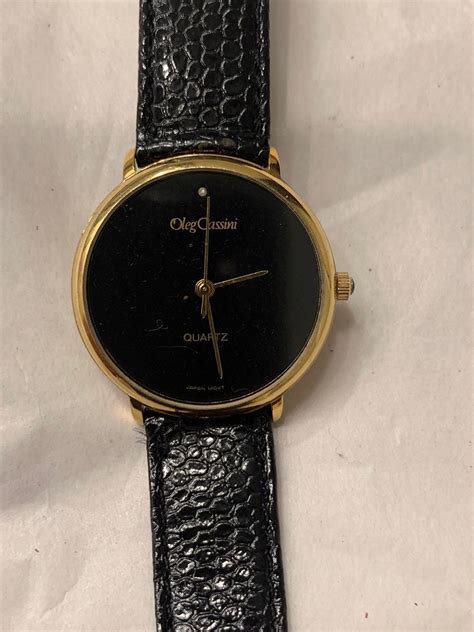 how much is a oleg cassini watch worth  The brooch is signed Oleg Cassini on the back