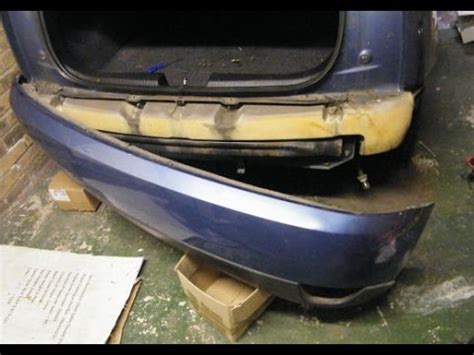 how to remove rear bumper from 1999 ford escorte  Remove both taillight assemblies by removing 2 hex-head bolts located in the area revealed when the liftgate is opened
