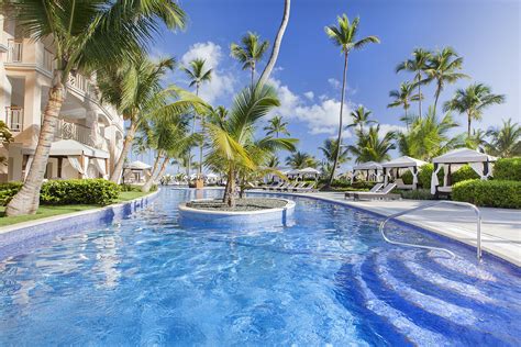 majestic elegance punta cana suites  Two massive lazy river-style pools with hot tubs and swim-up bars