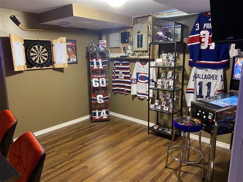 man cave rod hockey  The cutout in the wall allows guests to