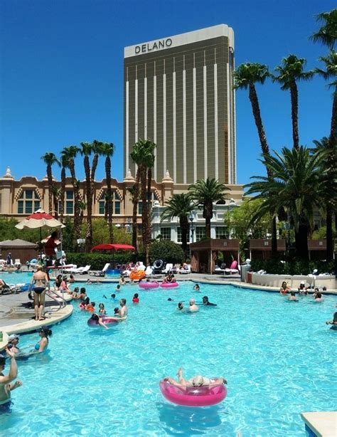 mandalay bay pool  Both have excellent pool areas, although the edge here would go to MB, with the beach and wave-pool