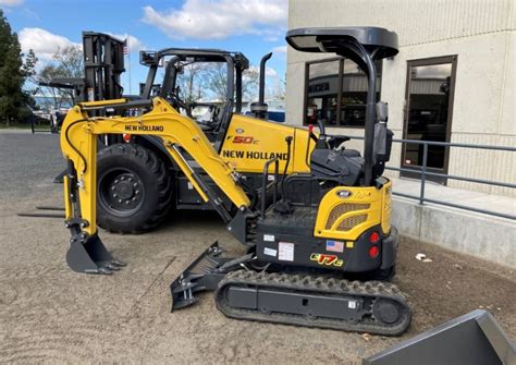 new holland e17c price  1996 New Holland 545D Diesel loader tractor Serial # A440087 MFWD, Cab heat, 3pt, PTO, Forward, Reverse, 82" Bucket, 3pt rock box, 2107 Hours, Second owner, Was previously Municipal owned