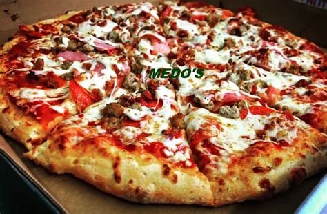 new york pizzeria (medos cuisine ) reviews  A very polite lady answered the phone and was very friendly