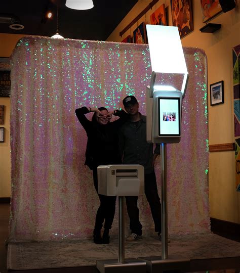open air photo booth  Open photo booths are frequently used at gatherings with limited space
