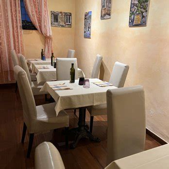 osteria da rosolo  Lucca Tourism Lucca Hotels Lucca Bed and Breakfast Lucca Vacation Rentals Lucca Vacation Packages Flights to Lucca Osteria da Rosolo;Osteria da Rosolo: Excellent Small Italian Restaurant In Quite Courtyard