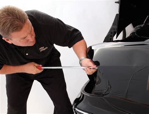 paintless dent repair utah Before and after photos of our paintless dent removal process