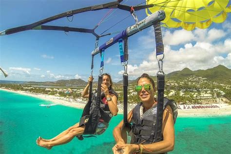 parasailing in st. kitts  Parasailing over Orient Bay is an outdoor adventure that presents views from 300 feet (91 meters) in the air