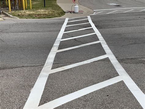 parking lot striping louisville ky  Potholes, broken curbs & more