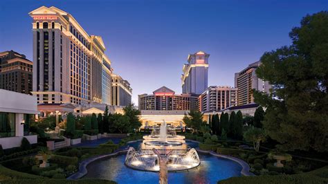 pictures of caesars palace  It features two pillow-top queen beds and décor of cool grey tones accented by red and