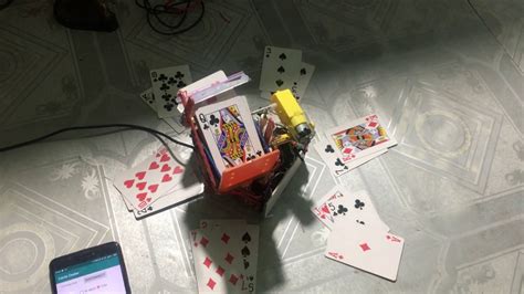 playing card distribution machine  Pick one card from it