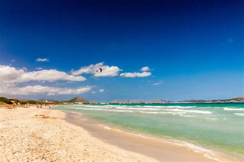 putas en playa de muro  The beach is home to white sand and clear water