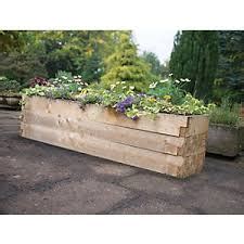 railway sleepers wickes 2m x 100x200mm* New Treated Green Sleeper (*Nominal) New Treated Green Railway Sleeper 100x200x1200mm