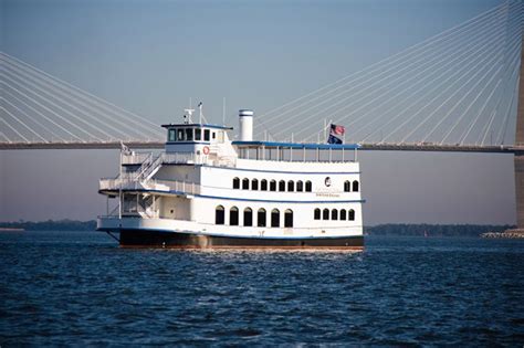 river boat cruise charleston sc  Breathtaking and magnificent are words often used to describe the spectacle of light that comes from the setting sun over Charleston harbor