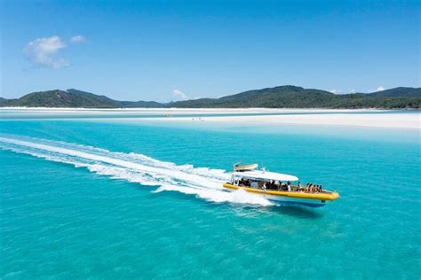 sailing whitehaven beach  Explore the Whitsunday Islands in an optimal way—on a high-speed catamaran—during this full-day tour from Airlie