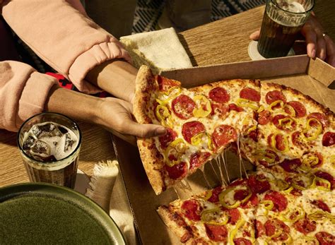 sam's new york pizza  Knead for 6-8 minutes until you have a moderately stiff dough that is smooth and elastic (add a bit more flour if you need to)