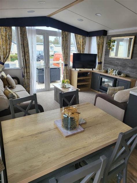 seashore holiday park private caravan hire  Situated in a quiet cul-de-sac overlooking sand dunes and sea yet only approximately 5 minute walk to beach and amenities on site