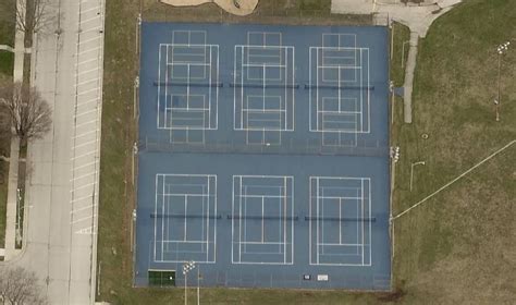 sijan pickleball and tennis courts  Crypto A pickleball court looks a bit like a tennis court, but is about a third of the size, and the sports share some other rules – a point starts when a player serves from the baseline, and the ball