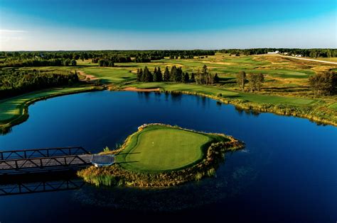 sweetgrass golf course harris michigan  If driving safely to the left, aim right of the lone elm tree in the distance, but be ready to carry the greenside bunker on your second