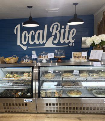 the local bite nsb photos com The beachy blue and white-themed restaurant is a cozy counter-service eatery with outside seating only