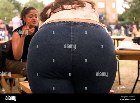 A woman bending over with her underwear showing Stock Photo - Alamy