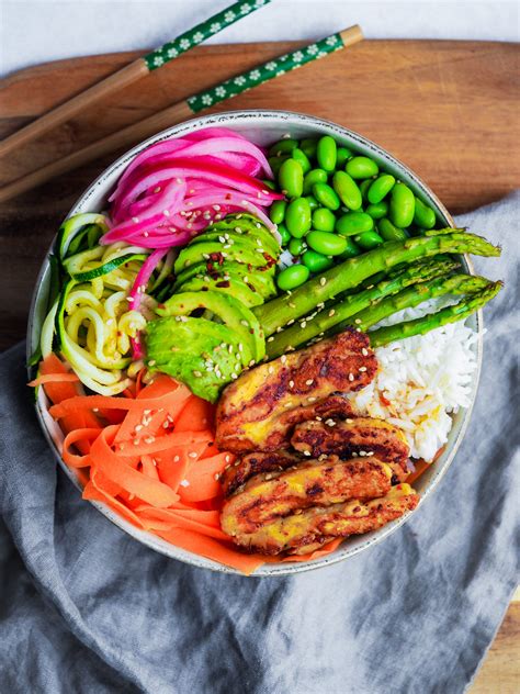 togarashi marinated halloumi poke bowl  Assemble the bowls with the rice, shredded cabbage, carrot, cucumber, mango, black beans, pickled ginger, and basil