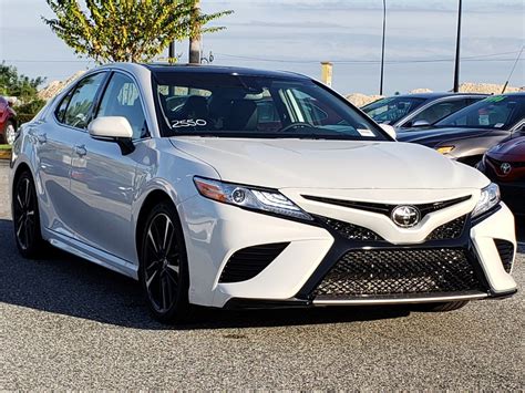 2024 toyota camry le. 2024 Toyota Camry XSE Hybrid: $34,295. The XSE is the most distinctive of the hybrid trims, building off the SE trim like the XLE does with the LE. Above the SE’s standard fare, the XSE adds full LED headlights, a gloss-black grille with mesh insert, 19-inch gloss black wheels, and color-keyed heated outside mirrors. 