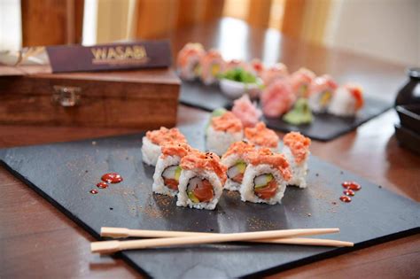 wasabi lounge  choice of a california roll or spicy tuna roll with tuna, salmon, shrimp & unagi sushi