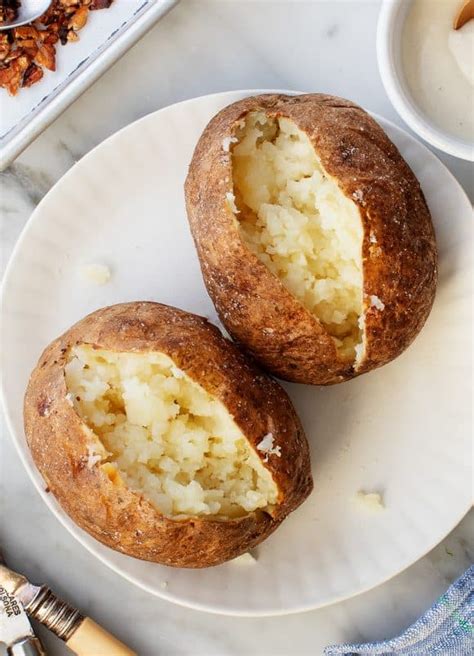 wholepotato  Poke potatoes several times with a fork; place onto a microwave-safe plate