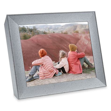 wirecutter digital picture frame 9 inches (HWD), with a vaguely triangular side profile that tilts the 8-inch screen back