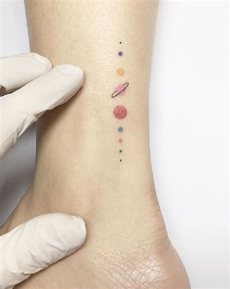 21 Solar System Tattoos Designs that would complement your