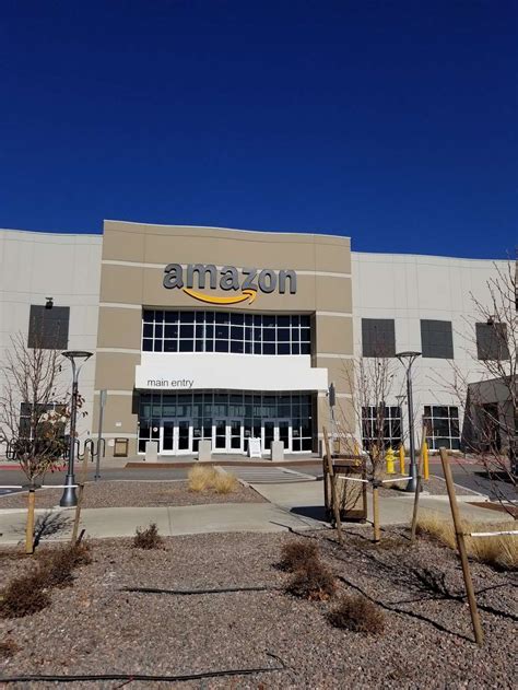 Amazon Warehouse Locations and Codes. An Amazon building displaying the Amazon logo. With almost 200 facilities in the US and around the world, Amazon's warehouse network is one of the largest in the world. These facilities range from 600,000 to 800,000 square feet in size. Each of the buildings has a capacity of 1000 to 1500 associates.. 