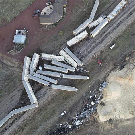 23 freight cars, new vehicles heavily damaged in train derailment in northern Arizona