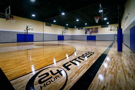 When designing an indoor basketball court, the height of the ceiling must be at least 16 feet. With a regulation rim resting 10 feet above the floor, there must be adequate space f.... 