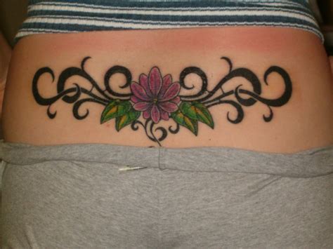 25 Cute Lower Back Flower Tattoos For Girls - EntertainmentMesh