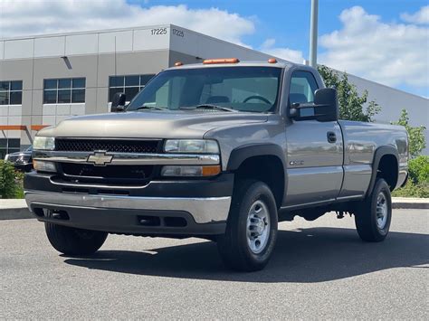 Mileage: 50,099 miles Color: White Body Style: Pickup Engine: 8 Cyl 6.6 L Transmission: Automatic. Description: Used 2017 Chevrolet Silverado 2500HD Work Truck with Four-Wheel Drive, Spare Tire, Tinted Windows, Folding Mirrors, Locking Differential, Front Bench Seat, Steel Wheels, Rear Bench Seat, Front Stabilizer Bar, Trailer Stability Assist ....