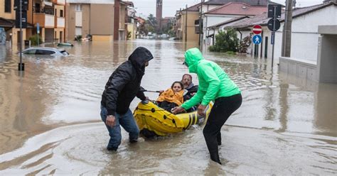 3 dead as heavy rains in northern Italy burst riverbanks, flood towns