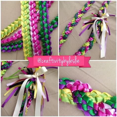 3 strand ribbon lei. Crease firmly. Thread a pony bead onto a piece of 9" long ribbon. Tie the ribbon around the middle of the folded bill with the pony bead on the edge of the folded bill. Open up the folded bill and use double-sided tape to form a flower. Attach the money flowers to the ribbon lei. 